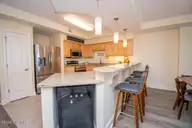 1550 Salter Path Road 606, Indian Beach, NC 28512 — 3-bedroom waterfront condo in The Nautical Club, Indian Beach, NC, photo 10 of 45: Kitchen/Bar