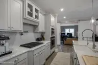 713 Cecil Point, Wilmington, NC 28412 — 4-bedroom waterfront home in Riverlights, Wilmington, NC, photo 19 of 75: Cecil713-5kitShaneL33A4143-CR2