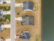 34 Lighthouse Cove Loop 113, Calabash, NC 28467 — 3-bedroom waterfront home in Lighthouse Cove, Calabash, NC, photo 3 of 46: 2-web-or-mls-DJI_20260208114130_0322_D