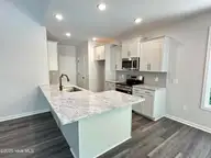 3188 Oak Drive SW, Shallotte, NC 28470 — 3-bedroom home in River Hills, Shallotte, NC, photo 2 of 28: 3188 Oak Dr Kitchen