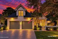 1809 Mews Drive, Wilmington, NC 28405 — 5-bedroom waterfront home in Landfall, Wilmington, NC, photo 4 of 72: 1809MewsDrive-2_Dusk_V2