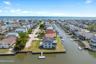 402 Dolphin Street, Sunset Beach, NC 28468 — 3-bedroom waterfront home, Sunset Beach, NC, photo 5 of 53: Stroll straight to Beach Access