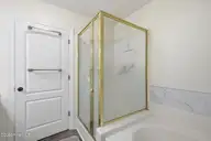 402 Penny Lane D, Morehead City, NC 28557 — 3-bedroom condo in Madisen Park, Morehead City, NC, photo 10 of 46: En Suite Walk-In Shower