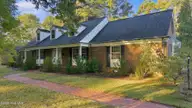 209 Brentwood Drive N, Wilson, NC 27893 — 4-bedroom home in Brentwood Forest, Wilson, NC, photo 4 of 60: Front 4