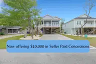 152 NE 1st Street, Oak Island, NC 28465 — 3-bedroom home in Tranquil Harbor, Oak Island, NC, photo 1 of 44