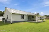 107 Fodder Drive, Hubert, NC 28539 — 3-bedroom home in Ole Mill Village, Hubert, NC, photo 7 of 59: 07_Rear_Side