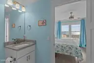 4321 E Beach Drive, Oak Island, NC 28465 — 6-bedroom waterfront home in E. Long Beach, Oak Island, NC, photo 19 of 49: 6-web-or-mls-BTS01860