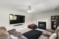 156 Weste Avenue, Jacksonville, NC 28540 — 4-bedroom home in Bryan Farms, Jacksonville, NC, photo 13 of 47: Living Room