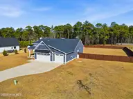 195 Gus Horne Road, Holly Ridge, NC 28445 — 3-bedroom home in Topsail Bluff, Holly Ridge, NC, photo 5 of 44: 5_aerialfront3