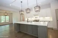 102 Greystones Court, Pinehurst, NC 28374 — 4-bedroom home in National, Pinehurst, NC, photo 13 of 55: Kitchen island