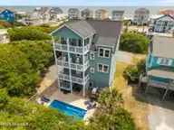 6 Bottlenose Boulevard, North Topsail Beach, NC 28460 — 4-bedroom waterfront home in Dolphin Shores, North Topsail Beach, NC, photo 7 of 48: 8-web-or-mls-DJI_20250506132005_0219_D