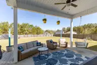 205 Mango Place S, Hubert, NC 28539 — 3-bedroom home in Camden Woods, Hubert, NC, photo 22 of 30: Covered porch