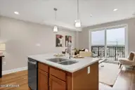 14 Grace Street 1120, Wilmington, NC 28401 — 1-bedroom condo in River Place, Wilmington, NC, photo 6 of 23: Kitchen Island