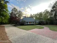 80 Wilson Road, Pinehurst, NC 28374 — 3-bedroom home in Unit 2, Pinehurst, NC, photo 6 of 74: Aggregate Driveway