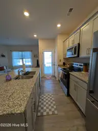 1505 Gracie Lane, Carthage, NC 28327 — 3-bedroom townhome in Carriage Place, Carthage, NC, photo 4 of 24: kitchen