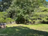 6429 River Road, Washington, NC 27889 — 3-bedroom home in Country Club Estates, Washington, NC, photo 23 of 24: 023 Peaceful Back Yard