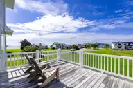 516 Blue Heron Drive, Newport, NC 28570 — 3-bedroom waterfront home in Blue Heron Bay, Newport, NC, photo 21 of 62: Deck with expansive sound views