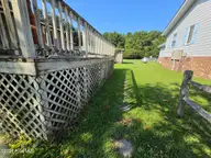258 Hideaway Road, Belhaven, NC 27810 — 2-bedroom waterfront home in Sportsmans Hide-Away, Belhaven, NC, photo 11 of 48: 011 Right walk to rear yard