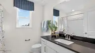 1125 Summer Daisy Drive, Aberdeen, NC 28315 — 4-bedroom home in Martin Farms, Aberdeen, NC, photo 21 of 28: Bathroom