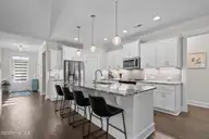 2267 Reefside Loop NE, Leland, NC 28451 — 3-bedroom home in Compass Pointe, Leland, NC, photo 9 of 71: kitchen