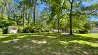 648 Old Church Road, Swansboro, NC 28584 — 3-bedroom manufactured home in Cedar Creek Est, Swansboro, NC, photo 13 of 37: backyard