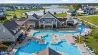 537 Moss Lake Lane, Holly Ridge, NC 28445 — 3-bedroom home in Summerhouse On Everett Bay, Holly Ridge, NC, photo 4 of 72: 62_dji_20240815175137_0073_d