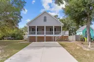 101 SW 28th Street, Oak Island, NC 28465 — 5-bedroom home in Pinners Point, Oak Island, NC, photo 2 of 56: 1-web-or-mls-BTS03194