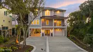 221 Porto Vista Drive, North Topsail Beach, NC 28460 — 5-bedroom waterfront home in Portofino, North Topsail Beach, NC, photo 1 of 73