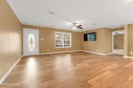 165 Godfrey Boulevard, Havelock, NC 28532 — 3-bedroom waterfront home in Godfreys Creek Estates, Havelock, NC, photo 4 of 52: Entry and living room