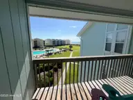 918 N New River Drive 333, Surf City, NC 28445 — 2-bedroom waterfront condo in Surf Condominiums, Surf City, NC, photo 2 of 38: IMG_7423