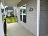 3218 School View Drive, Farmville, NC 27828 — 4-bedroom home in Dalton's Cove, Farmville, NC, photo 5 of 32: 3218Schoolporchview