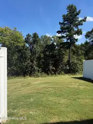 2709 Gracie Lane, Carthage, NC 28327 — 3-bedroom townhome in Carriage Place, Carthage, NC, photo 13 of 13: Back