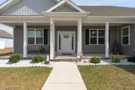 610 Bright Harvest Drive, Maysville, NC 28555 — 3-bedroom home in Batchelors Cove, Maysville, NC, photo 4 of 33: Covered Front Porch