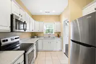 613 Elfin Court, Leland, NC 28479 — 2-bedroom townhome in Westport, Leland, NC, photo 12 of 28: Kitchen