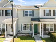 27 E Doris Avenue 207, Jacksonville, NC 28540 — 2-bedroom townhome in Doris Place, Jacksonville, NC, photo 1 of 37: Front