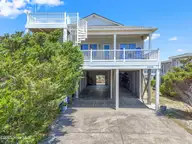 5408 W Beach Drive, Oak Island, NC 28465 — 4-bedroom waterfront home, Oak Island, NC, photo 2 of 47: 5408WBeachDr - 1