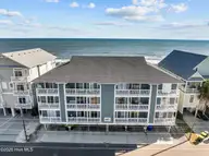 1308 Carolina Beach Avenue N Apt 2c, Carolina Beach, NC 28428 — 3-bedroom waterfront condo in Reefs, Carolina Beach, NC, photo 1 of 34: 2-print-3-print-DJI_20241203120746_0447_