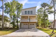 126 N Middleton Avenue, Oak Island, NC 28465 — 4-bedroom home in E. Long Beach, Oak Island, NC, photo 1 of 46: 126smiddleton_00001