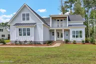 1101 Crown Pointe Drive, Hampstead, NC 28443 — 4-bedroom waterfront home in Crown Pointe, Hampstead, NC, photo 1 of 64