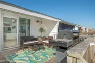 201 Freeman Lane C, Atlantic Beach, NC 28512 — 2-bedroom waterfront townhome in Club Colony, Atlantic Beach, NC, photo 15 of 33: Back Deck