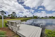 1230 Nightingale Court, Leland, NC 28451 — 3-bedroom waterfront home in Waterford of the Carolinas, Leland, NC, photo 3 of 75: Private Dock on Pond