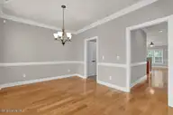 1254 Charleston Common Drive, Leland, NC 28451 — 3-bedroom home in Charleston Common, Leland, NC, photo 7 of 50: Formal Dining Room