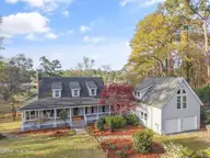 1321 Marsh Line Court SW, Shallotte, NC 28470 — 3-bedroom waterfront home in Marsh Cove, Shallotte, NC, photo 2 of 75: Low Country Style Home