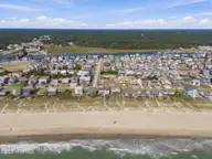 134 Ocean Boulevard E, Holden Beach, NC 28462 — 4-bedroom waterfront home in Holden Beach, Holden Beach, NC, photo 4 of 48: 7-web-or-mls-DJI_20261014131518_0903_D