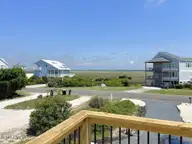 323 Caswell Beach Road, Oak Island, NC 28465 — 5-bedroom waterfront home in Caswell Beach, Oak Island, NC, photo 4 of 54: 323 Caswell Beach