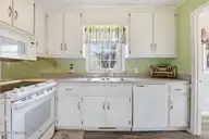 101 Shilou Drive, Pikeville, NC 27863 — 3-bedroom home in Sparrow Point, Pikeville, NC, photo 17 of 34: 101 Shilou Dr- Kitchen 2