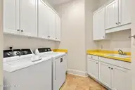 70 Royal Dublin Downs, Pinehurst, NC 28374 — 4-bedroom waterfront home in National, Pinehurst, NC, photo 23 of 53: Laundry room