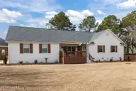 100 Stevens Court, Swansboro, NC 28584 — 3-bedroom waterfront home in River Reach, Swansboro, NC, photo 7 of 56: Front View