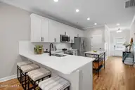 239 Cline Way Unit 109, Beaufort, NC 28516 — 3-bedroom townhome in 1809 Live Oak, Beaufort, NC, photo 8 of 45: Kitchen Open to Living Room