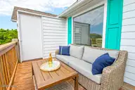 101 Shipwreck Lane E, Emerald Isle, NC 28594 — 3-bedroom waterfront townhome in Spinnakers Reach, Emerald Isle, NC, photo 17 of 38: Level 3 Deck